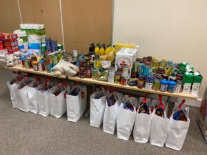 Food parcels for Savera UK clients a the end-of-year party
