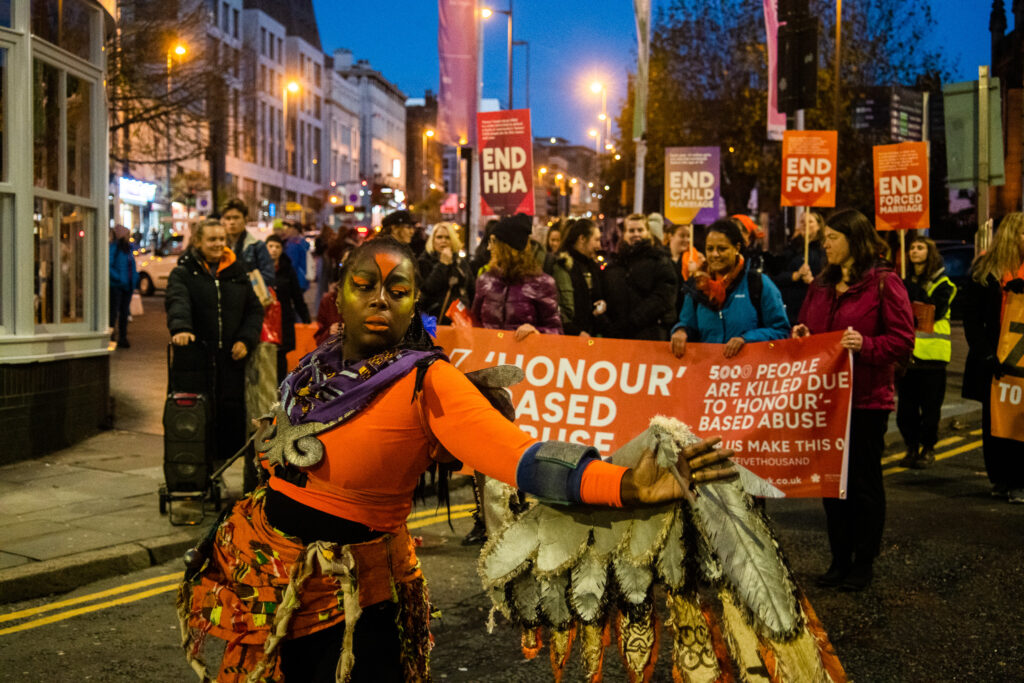 Movema's Sankofa Bird leads Savera UK's 5k to End HBA march through Liverpool city centre